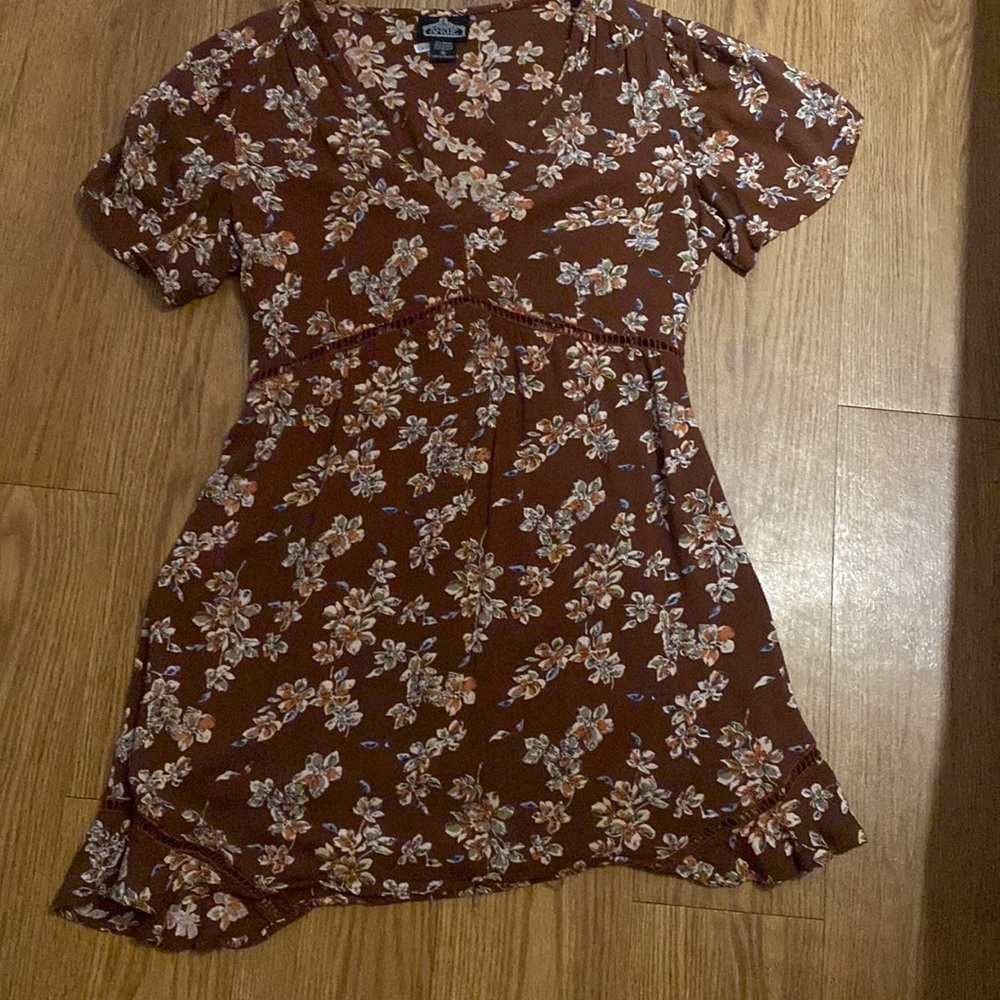 Gorgeous sundress great quality. Has cutouts on waistline/below bust